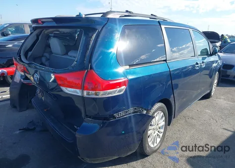 2011 Toyota Sienna Xle V6 z USA, uszkodzony, nr VIN 5TDYK3DC3BS084110